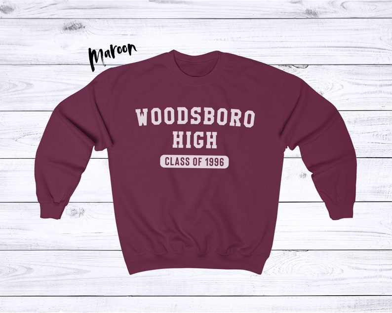 May include: Maroon sweatshirt with white text that reads "Woodsboro High Class of 1996".