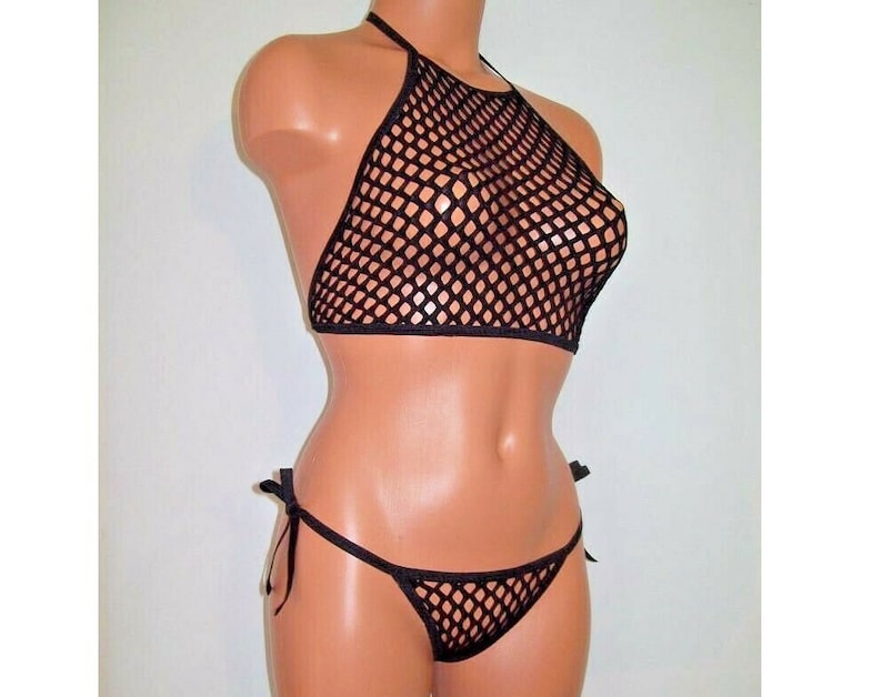 May include: Black mesh halter top and matching bikini bottom with a diamond pattern. The top has a halter neck and the bottom has adjustable ties.