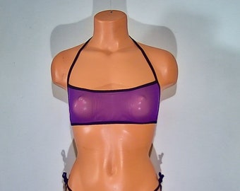 May include: Purple mesh halter top with black trim. The top is sheer and has a bandeau style.