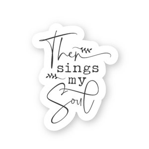 May include: A white sticker with the text "Then sings my soul" in a black, elegant script. The sticker has a decorative floral element. The design is suitable for journals, laptops, or water bottles.