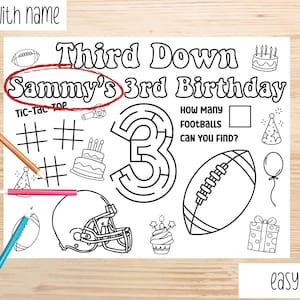 May include: A black and white printable birthday activity sheet with the text "Third Down Sammy's 3rd Birthday". Includes a football maze, tic-tac-toe, and football-themed illustrations. Colored pencils are scattered around the sheet.
