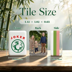 May include: A rectangular mahjong tile shown from the front, back, and side. The front displays the red text JOKER above a green dragon emblem. The back features a photograph of three children. Dimensions are 1.42 x 1.02 x 0.63 inches.