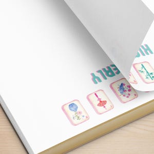 May include: A set of six colorful mahjong tiles with floral and bird designs. The tiles are arranged in a row on a white background. The text "HIGHER" is visible in the upper right corner of the image.