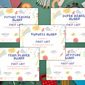 May include: Five colourful award certificates with playful designs. Each certificate features a different award title, such as "Future Teacher Award" and "Super Reader Award," along with space for a name and date. The certificates are decorated with rainbows, stars, and doodles.