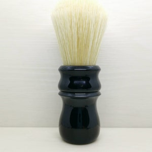 The &#39;Black Tulip&#39; Shaving brush. Handmade shaving brush made from resin, matched with natural or synthetic hair.