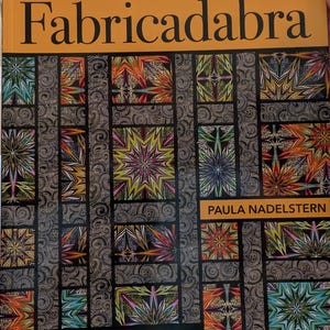 Fabricadabra: Simple Quilts, Complex Fabric by Paula Nadelstern Autographed