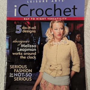 May include: A magazine cover for "iCrochet" by Leisure Arts. The cover features a woman wearing a beige crocheted jacket with a bow detail. Text includes "Day to Night Versatility" and "Serious Fashion for the Not-So Serious."