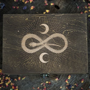 Unleash the Mystical Powers with our Engraved Wooden Box featuring Infinity Snake and Crescent Moon Designs. Perfect for Tarot and Esoteric