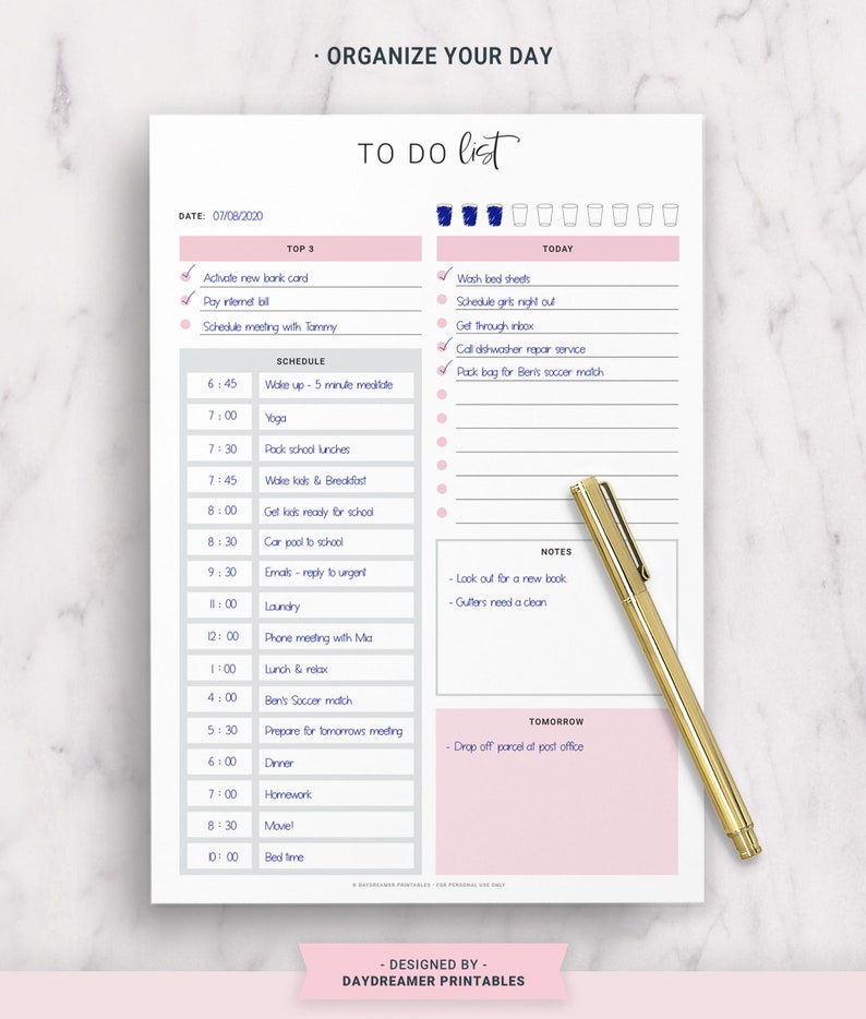 May include: A pink and white printable daily planner with a to-do list, schedule, notes, and tomorrow section. The planner includes a date field, top 3 priorities, and a section for today's tasks. The planner is designed by Daydreamer Printables.