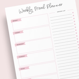 May include: A printable weekly meal planner with a grocery list section. The planner has a pink and white color scheme and features a handwritten title.