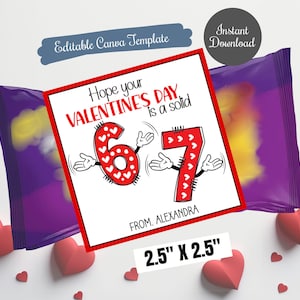 May include: A Valentine's Day-themed design featuring a red and white graphic with the numbers 6 and 7, with cartoon arms and hands. The text reads "Hope your VALENTINE'S DAY is a solid". The design is 2.5" x 2.5" and includes the text "FROM. ALEXANDRA".