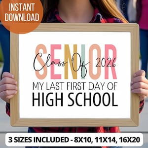 May include: A framed print with the words "SENIOR Class Of 2026" in a colourful design. The text "MY LAST FIRST DAY OF HIGH SCHOOL" is below. The print is held by a person. The words "INSTANT DOWNLOAD" are in a circle at the top left.