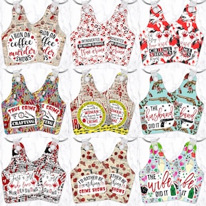 May include: A collection of nine pairs of acrylic keychains featuring various true crime and hobby-themed designs. Each keychain has a unique graphic print, including text like I RUN ON COFFEE & MURDER SHOWS, INTROVERTED BUT WILLING TO DISCUSS TRUE CRIME, and THE WIFE DID IT, with vibrant colors and patterns.