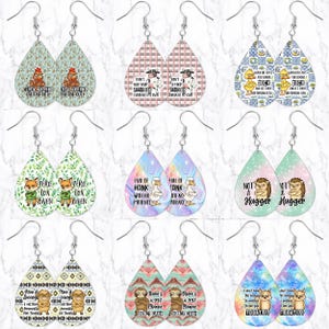 May include: A collection of nine pairs of teardrop-shaped earrings with various designs. The earrings feature images of animals like ducks, foxes, cows, and sloths, along with humorous text. The earrings have silver-colored hooks.