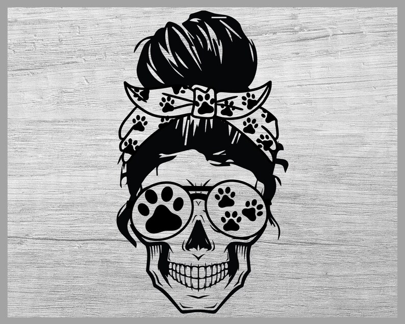 May include: Black and white illustration of a skull with a messy bun hairstyle, wearing a bandana with paw prints and sunglasses with paw print lenses.