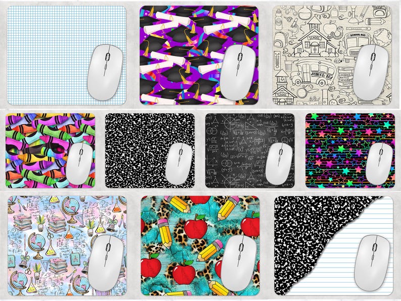 May include: A collection of mouse pads with various designs, including a blue grid, graduation caps and diplomas, school-themed doodles, colorful crayons, composition book paper, mathematical equations, and stars. Each pad has a white wireless mouse.