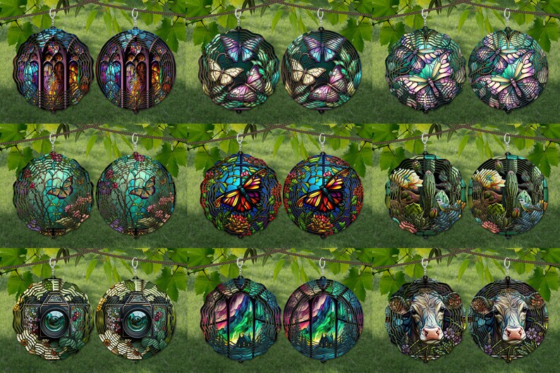 May include: Twelve decorative stained glass ornaments with various designs, including butterflies, flowers, and landscapes. The ornaments are suspended from a branch and have a black metal frame.