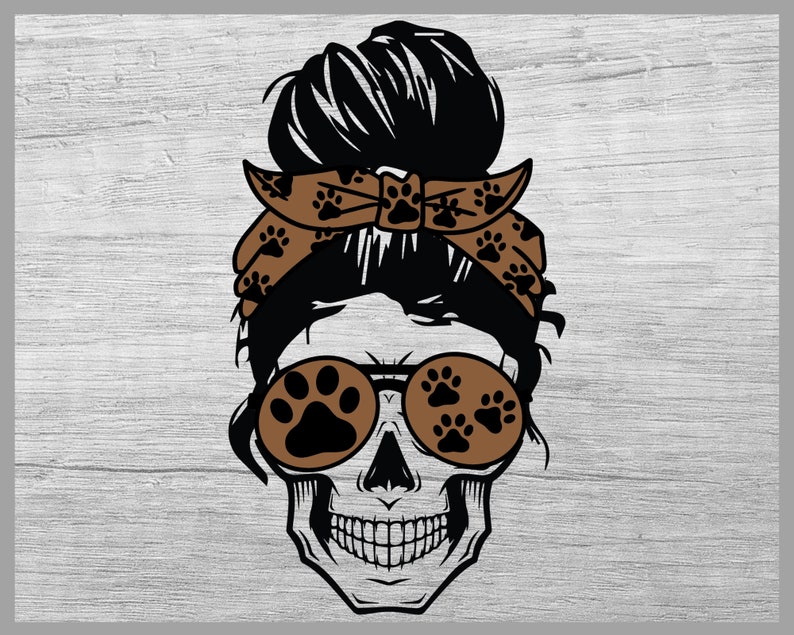 May include: A black and white skull with a brown bandana with paw prints and brown sunglasses with paw prints. The skull has a messy bun hairstyle.