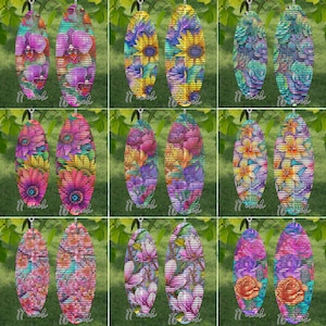 May include: Two sets of colorful oval-shaped wind chimes with different floral patterns. The chimes are 11 inches and 16 inches long.
