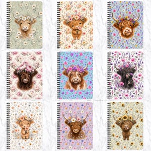 May include: A collection of nine spiral-bound notebooks featuring illustrations of highland cattle adorned with floral crowns. Each notebook displays a unique cow character set against a background of various flowers, including daisies, roses, and sunflowers.
