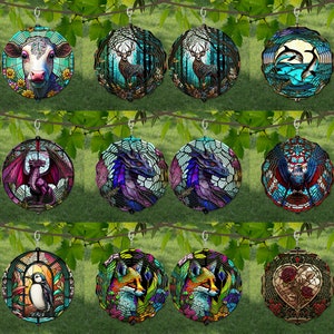 May include: A set of 12 pairs of stained glass earrings featuring various designs, including a cow, a deer, dolphins, a dragon, a bird, a fox, and a heart. The earrings are round and have a colorful, mosaic-like appearance.