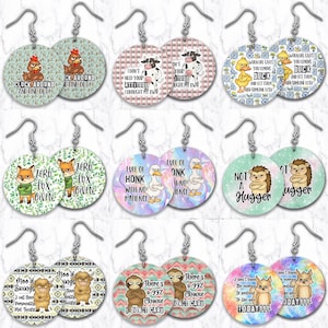May include: A collection of round, humorous earrings with various animal graphics and sassy phrases. Designs include chickens, cows, ducks, foxes, hedgehogs, sloths, and highland cows. Each earring has a silver hook.