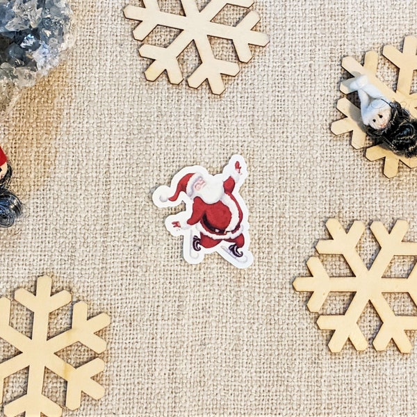 Sticker Père Noël Joyeux faisant du patin à glace