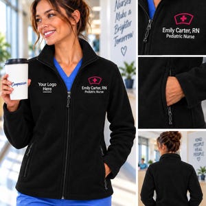 May include: A black fleece zip-up jacket featuring a high collar, long sleeves, and two zippered side pockets. The chest displays a pink medical cross icon above the text Emily Carter, RN Pediatric Nurse and a Your Logo Here placeholder.