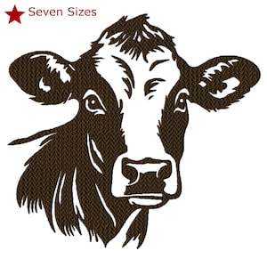 May include: A detailed brown and white cow face design. The image features a close-up of the cow's head, with intricate details in the fur and facial features. The text "Seven Sizes" is in the upper left corner.