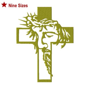 Peut inclure: Un motif brodé doré du visage de Jésus avec une couronne d'épines, placé sur une croix. Le texte "Nine Sizes" est dans le coin supérieur gauche. Le motif est sur fond blanc.