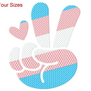 May include: A peace sign with a transgender pride flag design. The peace sign is made up of three sections: light blue, pink, and white. A small pink heart is to the left of the peace sign.