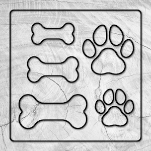 May include: A black and white image of three dog bone shapes and two paw prints. The shapes are outlined in black and are on a light gray background.