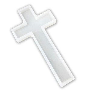 May include: White silicone mold shaped like a cross. The mold is designed to create a resin cross.