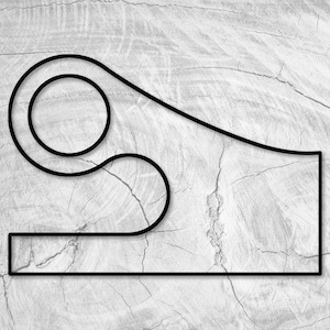 May include: Black and white line drawing of a racetrack with a loop-de-loop on a white woodgrain background.