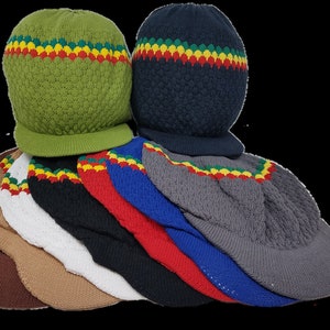 May include: A collection of knitted visor hats in various colors, including green, navy, gray, red, and brown. Each hat features a textured knit pattern and a band of red, yellow, and green stripes around the crown.
