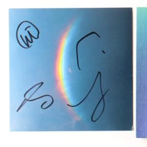 Coldplay "Moon Music" CD Insert Band-Signed JSA certification