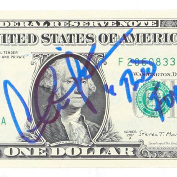 Charlie Sheen firmó "Wall Street" un billete de un dólar con la inscripción "Bud Fox" (Beckett)