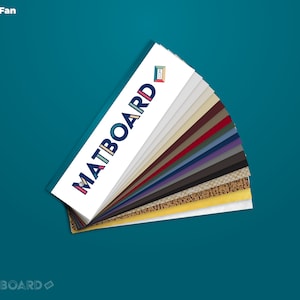 May include: A color fan with a variety of colors and textures. The fan is labeled "MATBOARD" and "CDM".