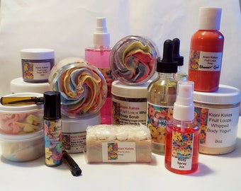 May include: A collection of colourful bath and body products with a fruit loops theme. The products include whipped body yogurt, shower gel, body spray, soap scrub, soap, and body butter. The products are all packaged in clear jars and bottles with colourful labels.