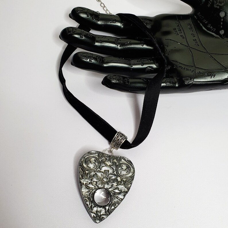 Goth and Occult. on a black velvet choker handmade resin Black planchette choker silver and black floral Ouija planchette