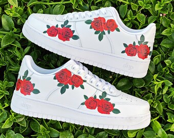 nike sneakers with flowers on them