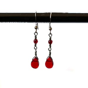Red drop crystal earrings with gunmetal grey wire