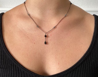 Black crystal pendant necklace with colored crystal accents