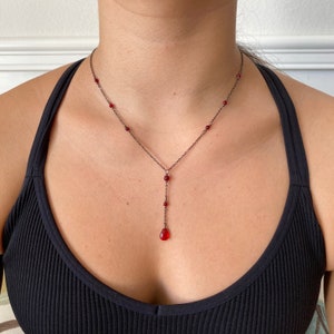 Red crystal drop necklace on delicate gunmetal grey or gold chain