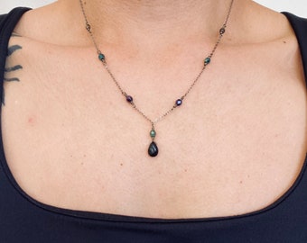 Black onyx pendant necklace with metallic bead accents