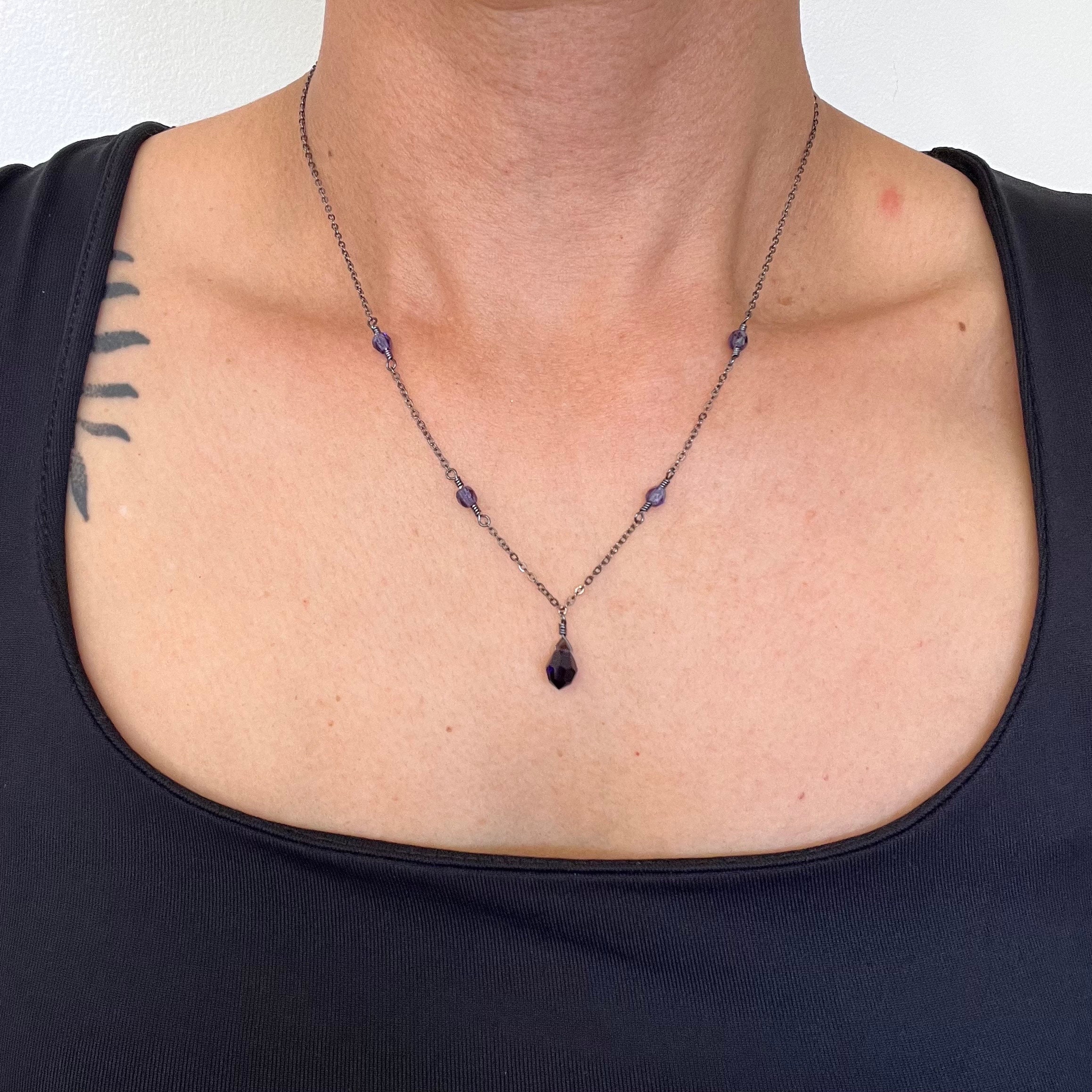 Tanzanite colored dark purple crystal drop necklace on delicate gunmetal grey chain, two versions