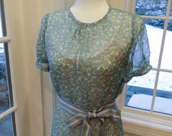 Unique handcrafted sheer silk apple dress from designer Kajani studio