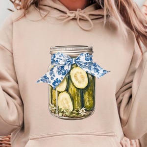 Coquette Pickle PNG, graphique vintage de cornichons en conserve, Png esthétique, amateur de cornichons, clipart cornichon avec noeud, Girlie png, époque douce fille