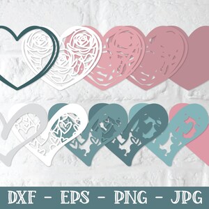 Pu&ograve; includere: Un set di 10 sagome di carta a forma di cuore sovrapposte con un design floreale. I cuori sono in tonalit&agrave; di rosa, grigio, bianco e verde acqua.