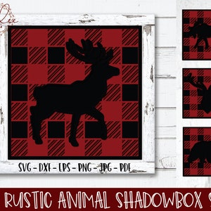May include: A set of four 3D shadowbox designs featuring rustic animal silhouettes on a red and black buffalo plaid background. The animals include a moose, a deer, a buck, and a bear.